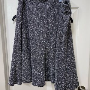 Thick, gray, business casual knee length shirt.